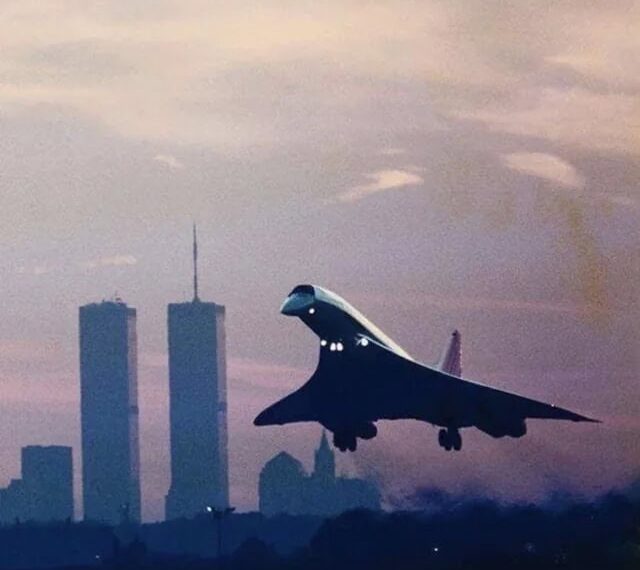 NYC skyline with a futuristic jet flying over the cityscape.